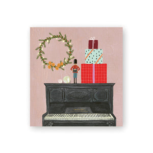 Package card Johanna Ilander - Christmas arrangement on top of the piano